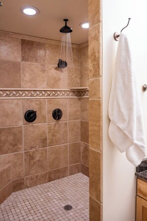 Shower, hair dryer, towels, soap