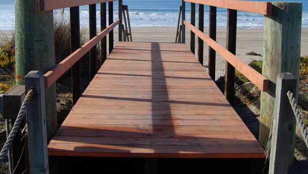 A wooden boardwalk leading to a beach with a clear view of the ocean. - Pajaro Dunes Vacation Home on Epic Private Beach for family or Romantic Getaway (Watsonville)
