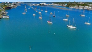 An aerial view of a marina with numerous sailboats docked. - Upscale Top-Floor Condo W/Gulf View, Sugary Sand Beach (Fort Myers Beach)