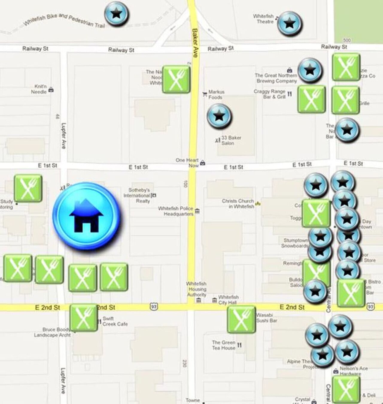 Un mapa con varios iconos que señalan restaurantes, una estación de policía y una plaza central.