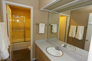 Combined shower/bathtub, hair dryer, towels, soap - Spacious condo with private deck, conveniently located to city and recreation (Cottonwood Heights)
