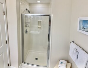Combined shower/tub, hair dryer, towels, soap