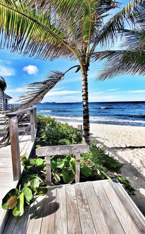 On the beach, sun loungers, beach towels