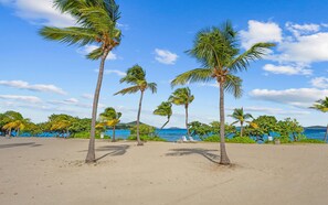 On the beach, sun loungers, beach towels