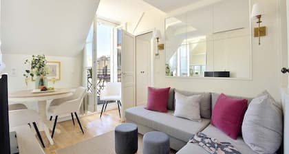 Elegant 1BR on Rue Cler w/Market Street Charm & Balcony Views