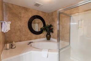 Combined shower/tub, hair dryer, towels, toilet paper