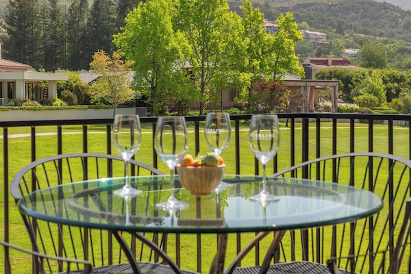 Cheers! Enjoy back patio with a spectacular view of Atlas Peak and Mt. George.