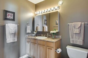 Combined shower/tub, hair dryer, towels, soap