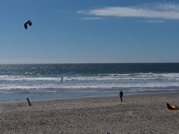 On the beach, sun-loungers, beach towels