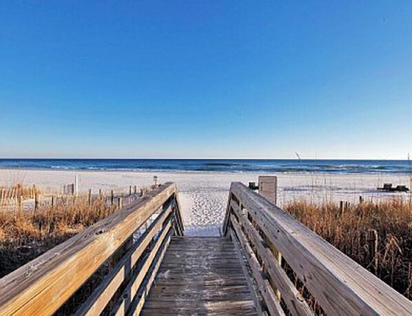 On the beach, sun-loungers