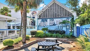 A building with a sign reading "Coconut Joe's" and "Isle of Palms."