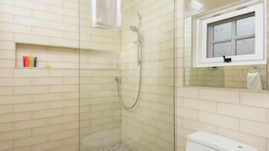 Hair dryer, towels, shampoo, toilet paper