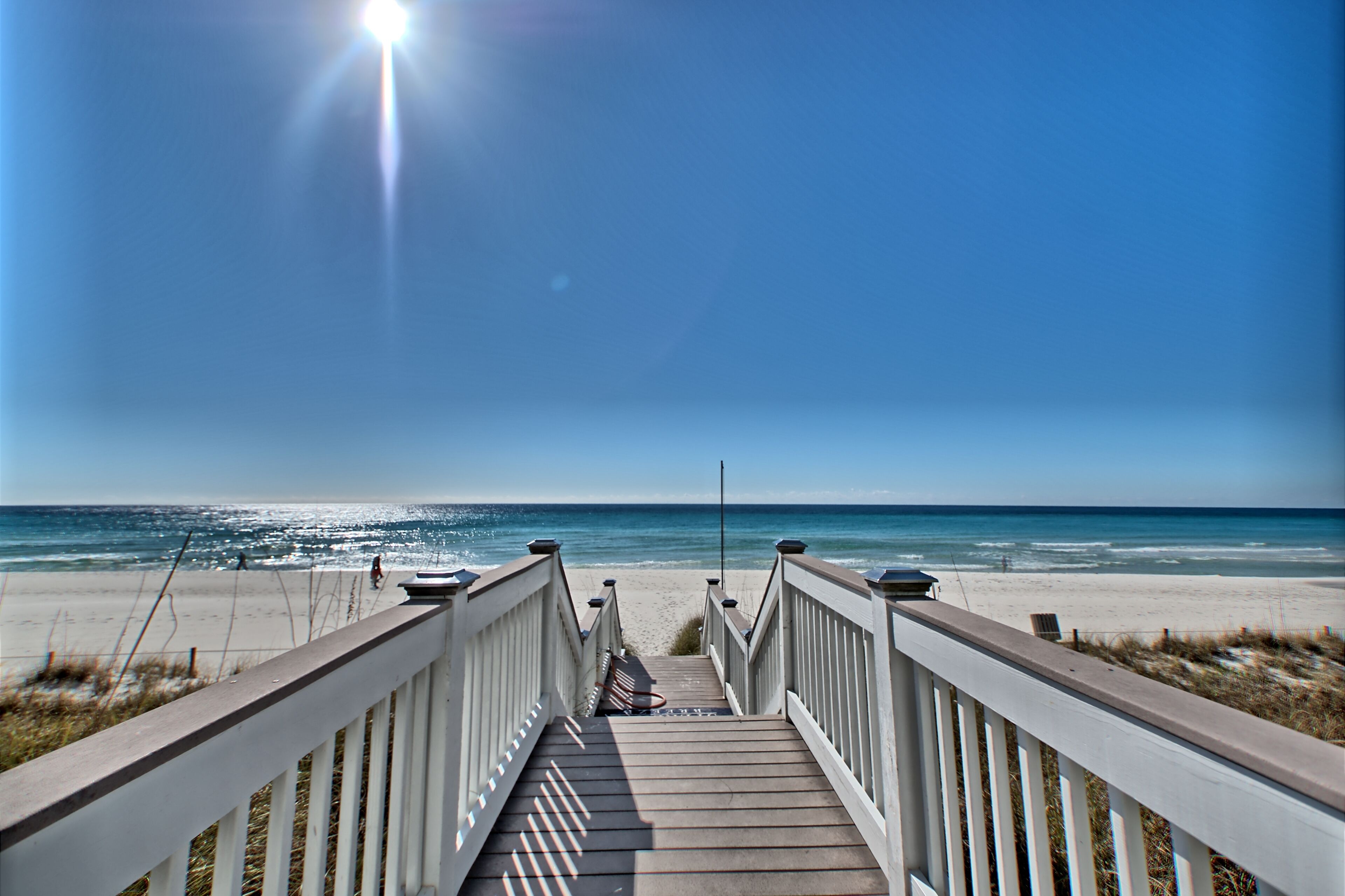 On the beach, sun-loungers