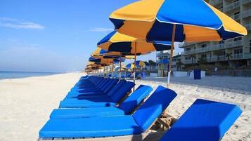 On the beach, sun loungers