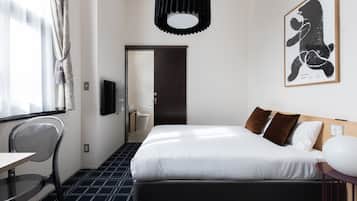 Down duvets, blackout curtains, iron/ironing board, free WiFi