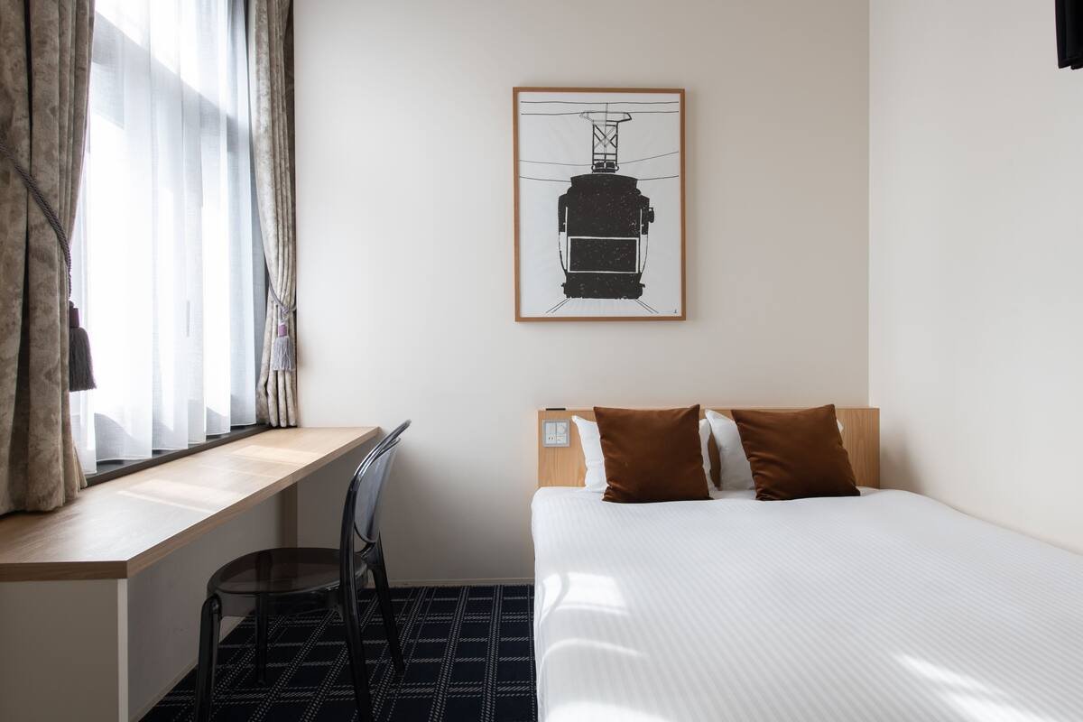 Down duvets, blackout curtains, iron/ironing board (on request)
