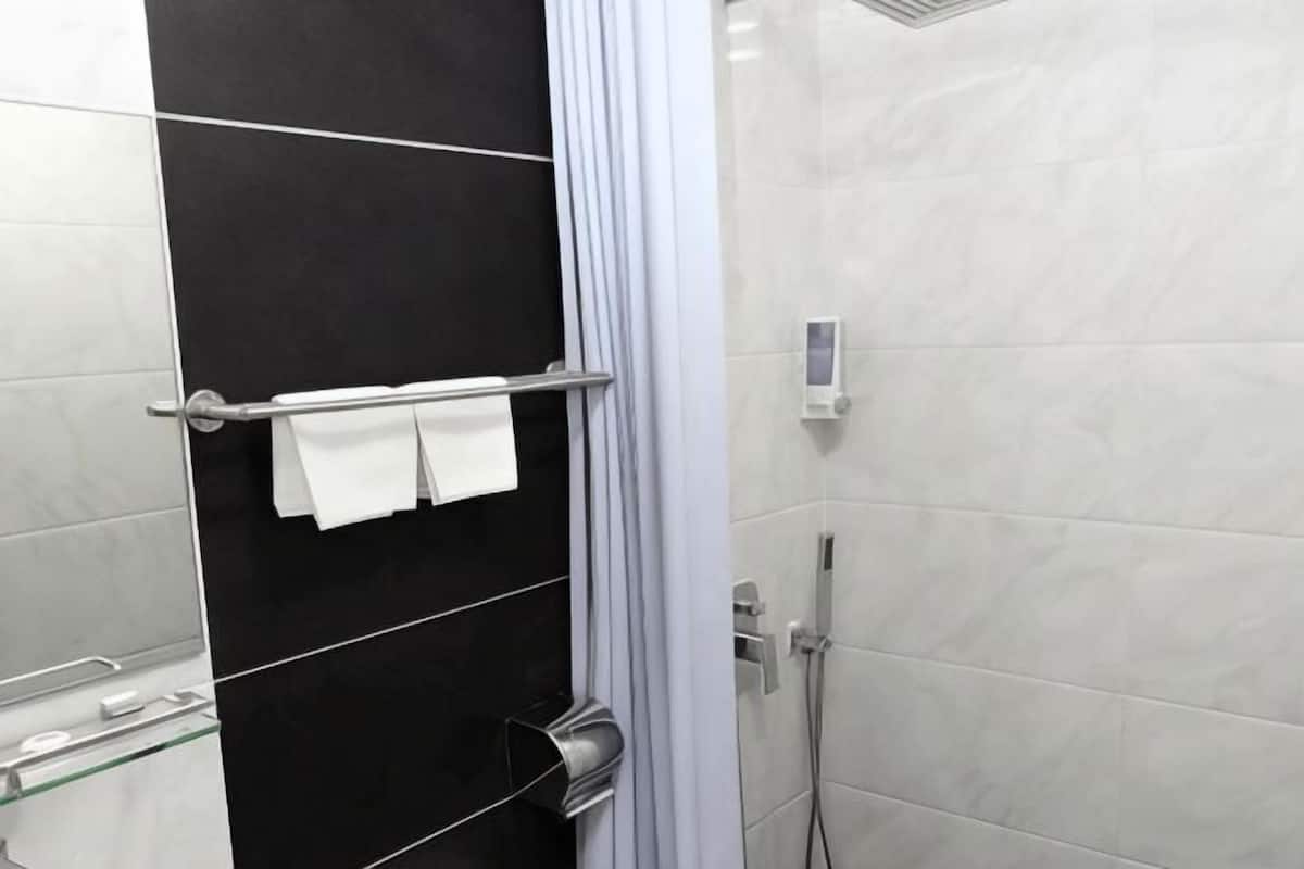 Bathroom | Shower, free toiletries, hair dryer, towels