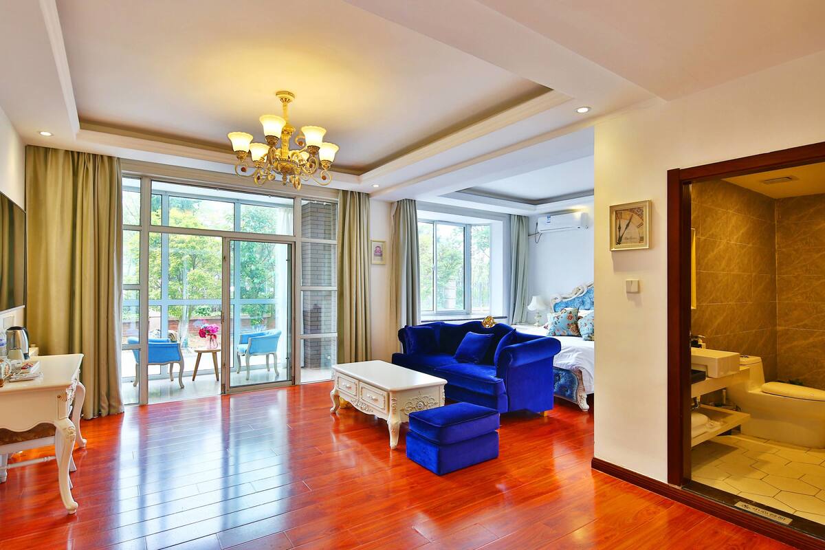 Minibar, desk, blackout curtains, iron/ironing board