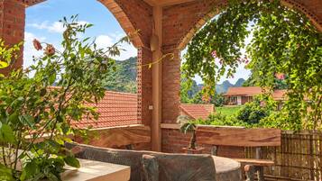 Familien-Vierbettzimmer | Terrasse/Patio