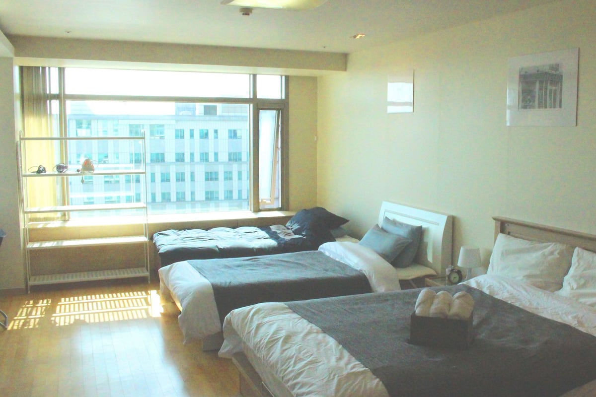 Family Room | Premium bedding, memory foam beds, desk, blackout drapes