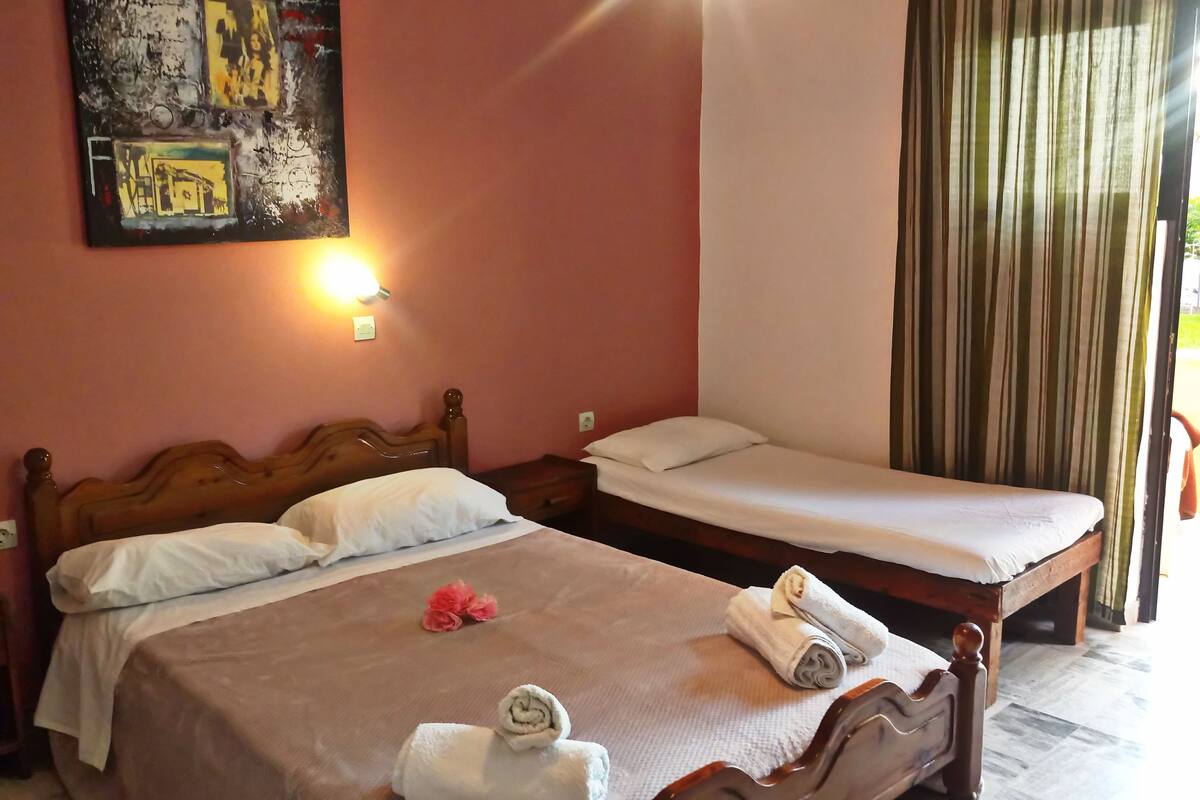 Economy Double Room | Iron/ironing board, free cots/infant beds, rollaway beds, free WiFi