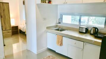 Villa, 2 Bedrooms | Living area | 42-inch flat-screen TV with satellite channels, TV