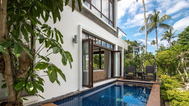 A modern house with a swimming pool, large windows, and a balcony with outdoor furniture. - 2 Br Luxury Villa SDV141 near the beachfront by Samui Dream Villas  (Koh Samui)