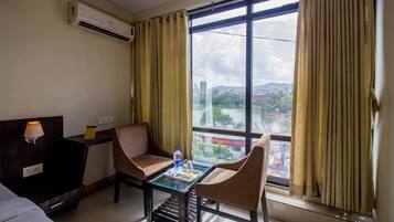 Habitación Deluxe | Ropa de cama de alta calidad, camas extra y wifi gratis