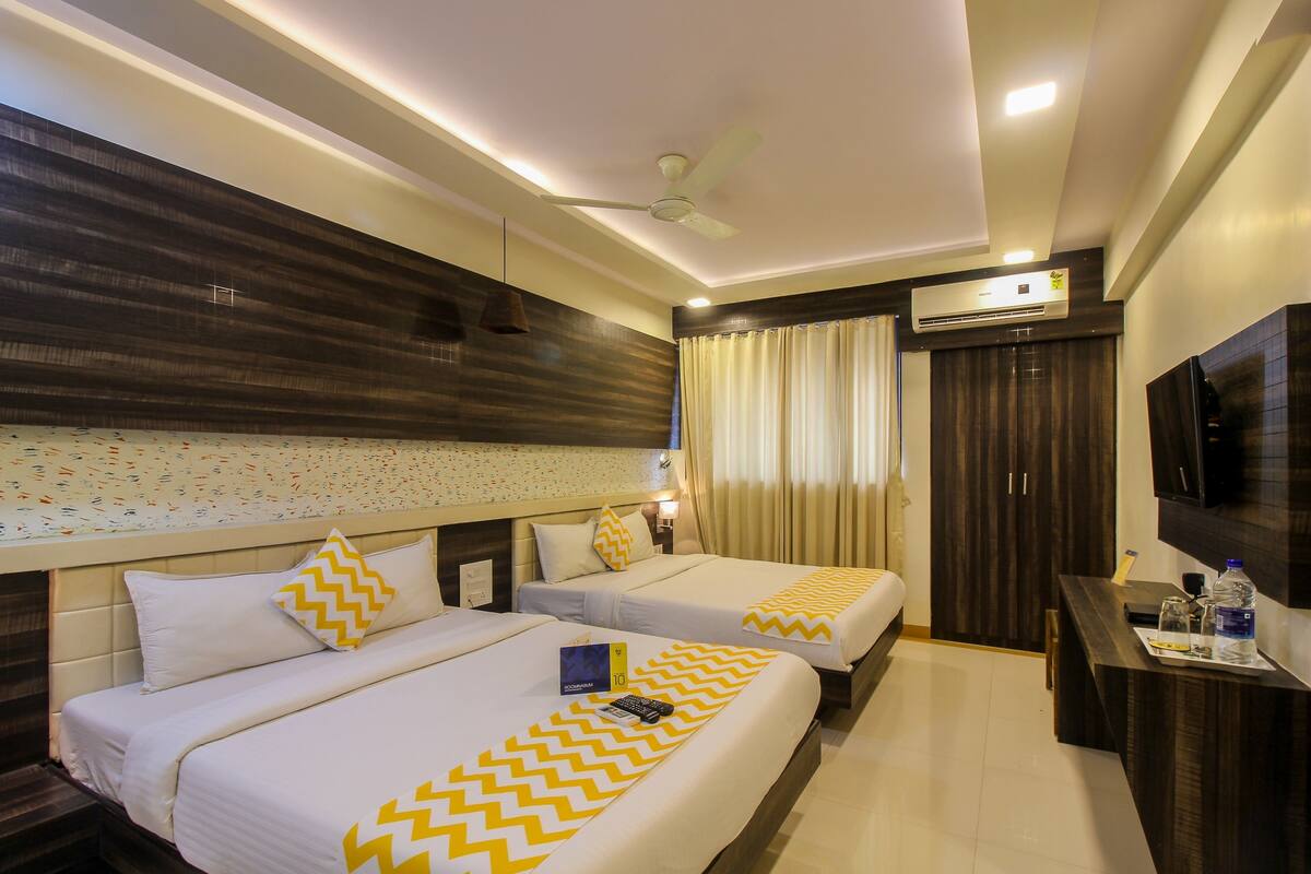 Habitación familiar | Ropa de cama de alta calidad, camas extra y wifi gratis