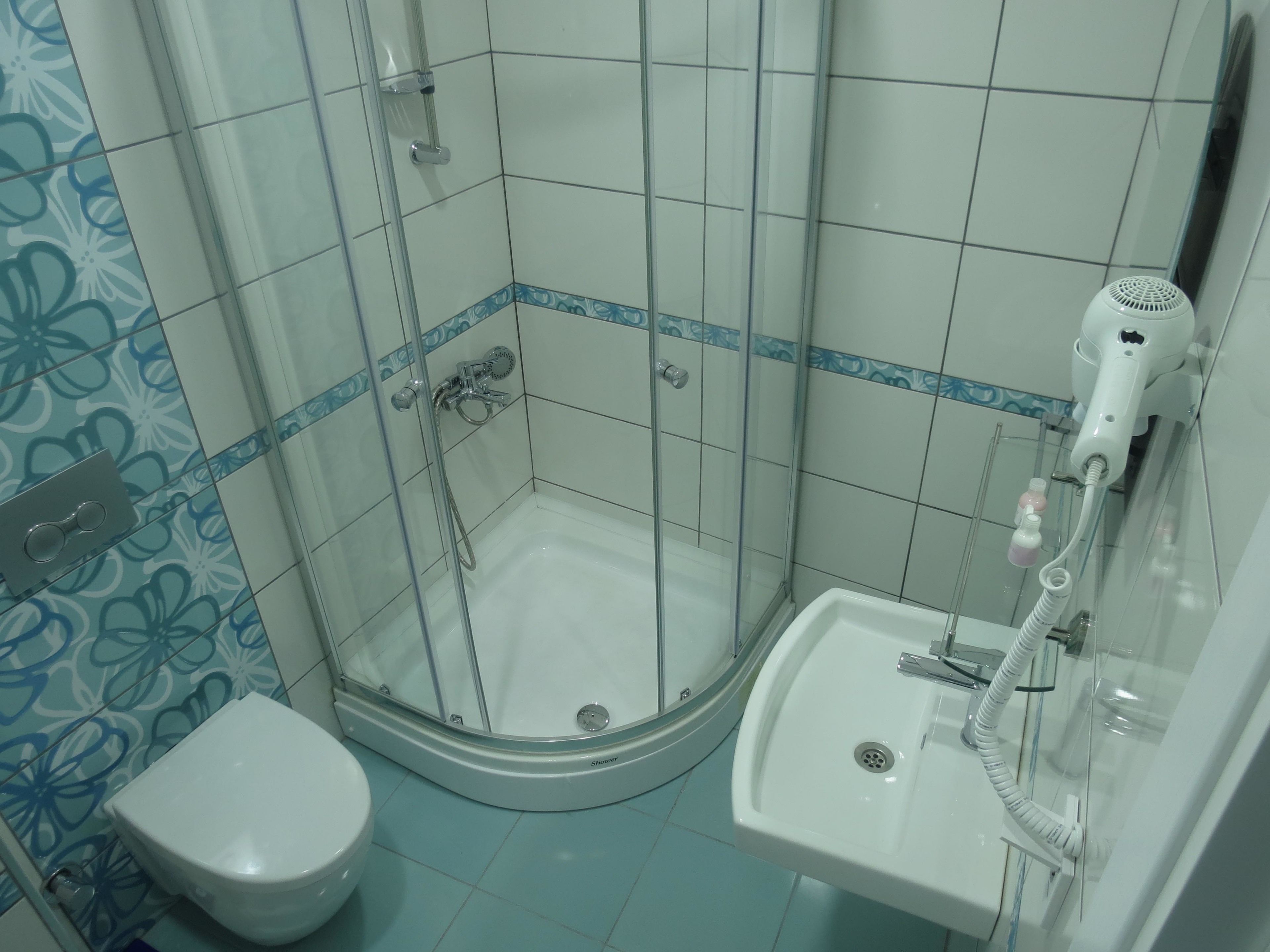 shower, free toiletries, hair dryer, slippers