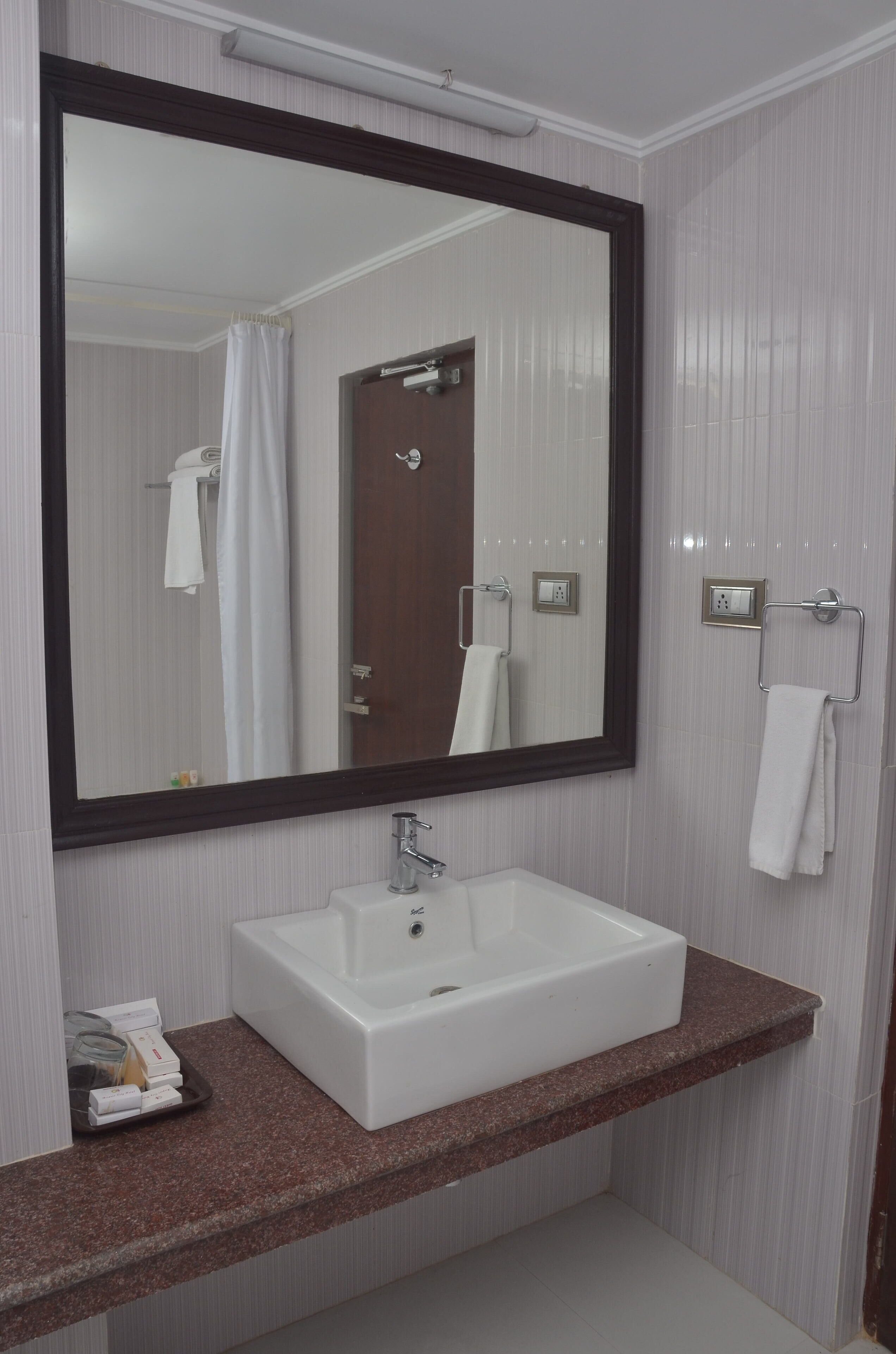 shower, rainfall showerhead, designer toiletries, hair dryer