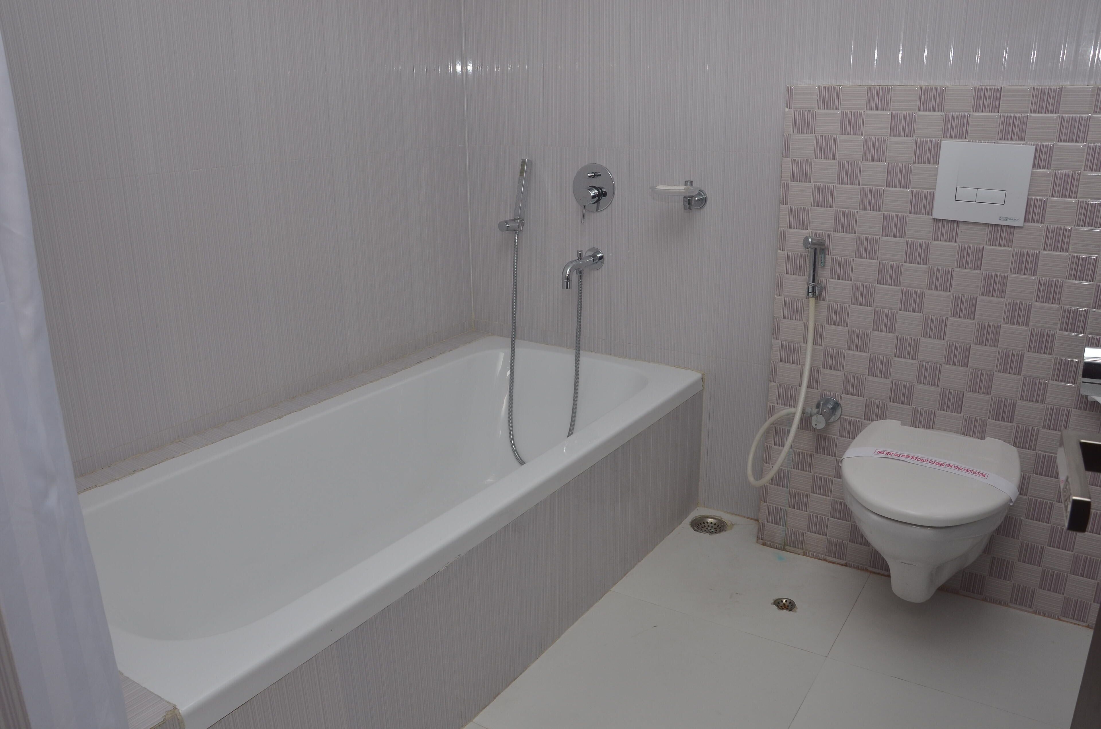 premium room | bathroom | shower, rainfall showerhead, designer toiletries, hair dryer