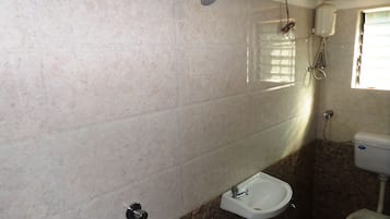 Standard Double Room Non AC | Bathroom | Shower, towels