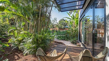 Bangalô design, 1 quarto, acessível, vista para o jardim | Terraço/pátio