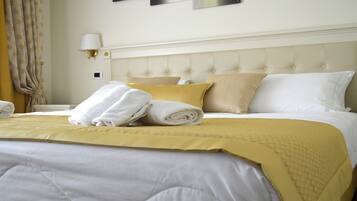 Ropa de cama de alta calidad y minibar