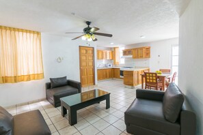 Apartment, 2 Bedrooms | Living room | Flat-screen TV - Suites Poliforum Inn (León)