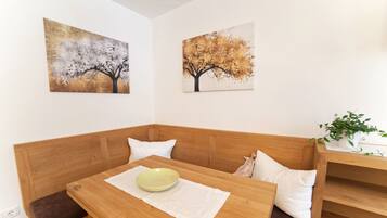 Family Room, Balcony (4 people) | In-room dining