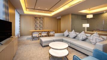 Suite, 1 Bedroom, City View | Minibar, in-room safe, desk, iron/ironing board