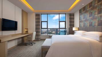 Suite, 1 Bedroom, City View | Minibar, in-room safe, desk, iron/ironing board