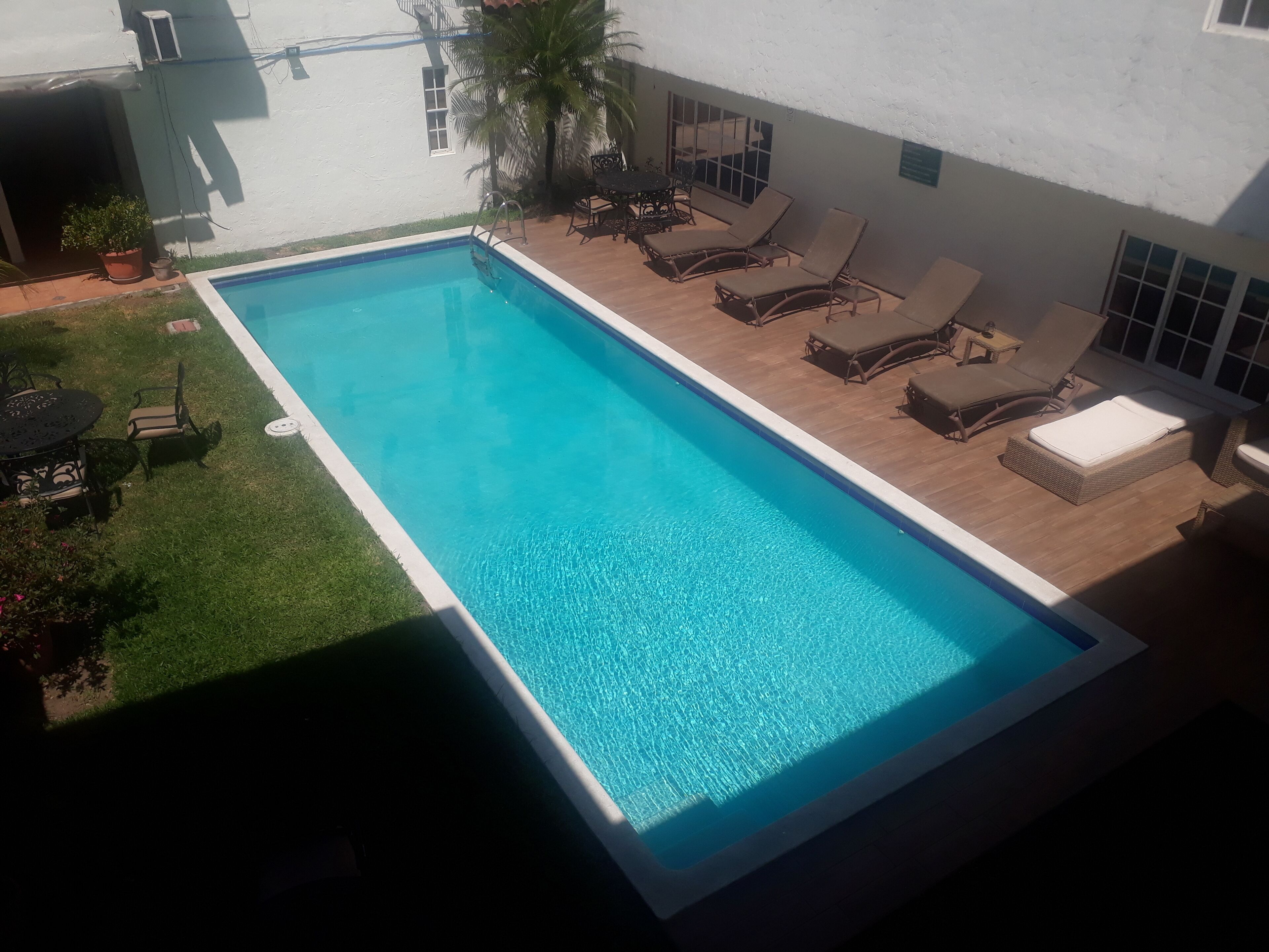 outdoor pool, pool loungers