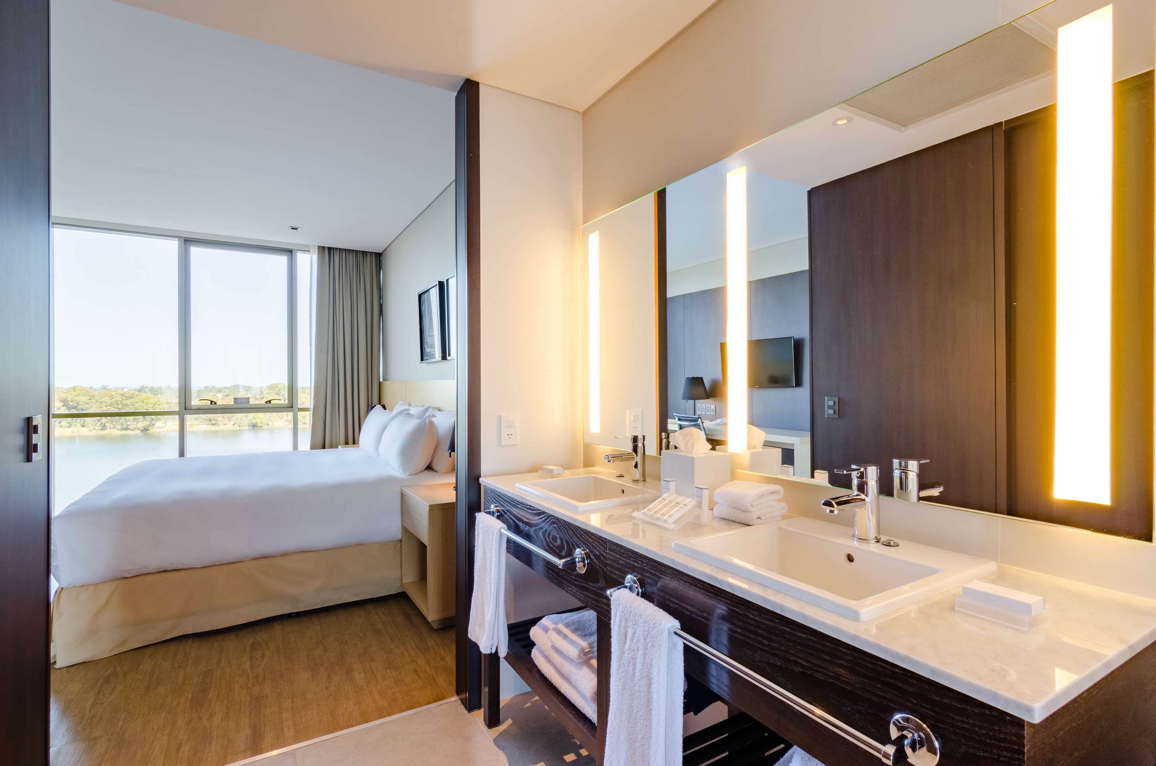 suite | in-room safe, desk, blackout curtains, soundproofing