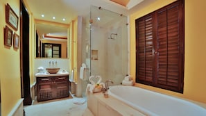 Bathtub, jetted tub, hair dryer, towels