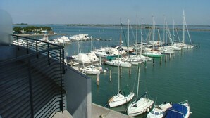 A marina with various boats docked.