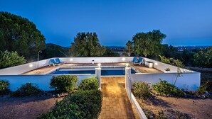 A rooftop pool area with two pools, lounge chairs, and a pathway leading to the pool. - Villa Susana ~ Heated Pool* ~ Fast Wi-fi ~ 6 + 4 cots - Booking 2027 & 2028 NOW! (Sao Bartolomeu de Messines)
