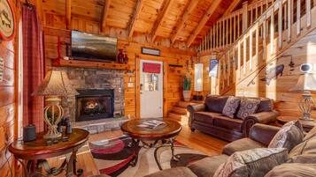 Smart-TV, Kamin, Videospiele, Bücher