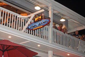 A balcony with a sign reading "Lava Jaya" and "Kailua-Kona". - Oceanfront Condo, 5G Wi-Fi, King Bed, Hot Tub/Pool, Free Parking (Kailua-Kona)