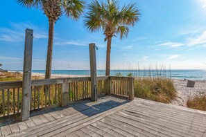On the beach, sun-loungers