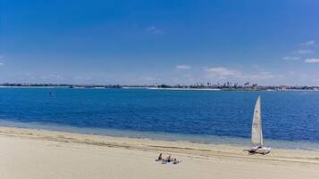 On the beach, sun loungers, beach towels