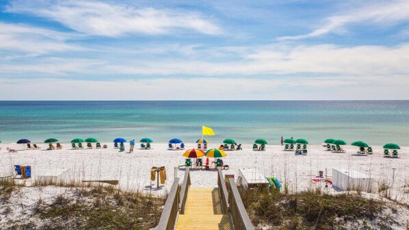 On the beach, sun-loungers