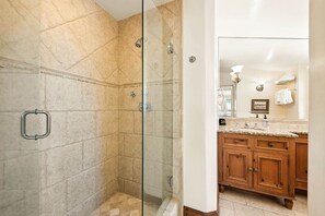 Bathtub, hair dryer, towels, soap